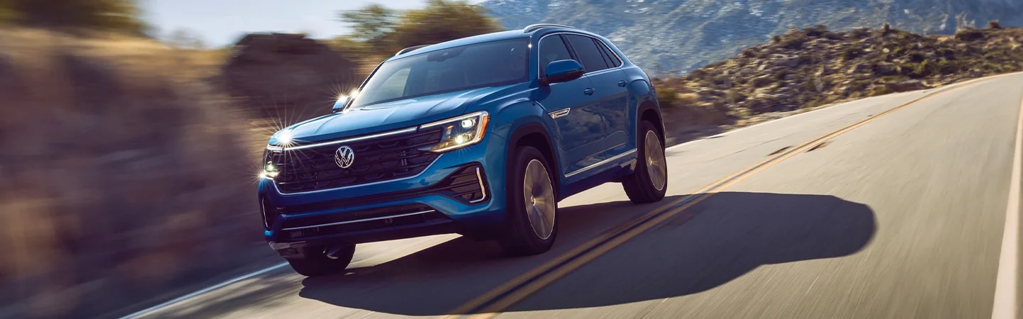 2024 Volkswagen Atlas Cross Sport Specs front side in blue 
