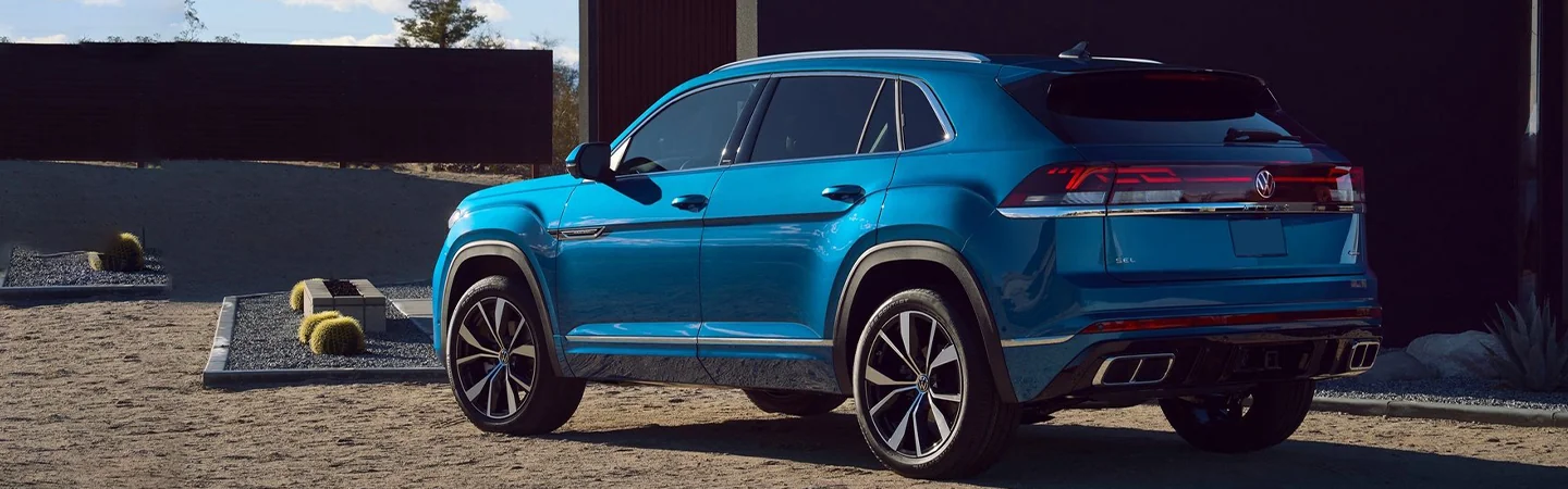 2024 Volkswagen Atlas Cross Sport Specs side back in blue 