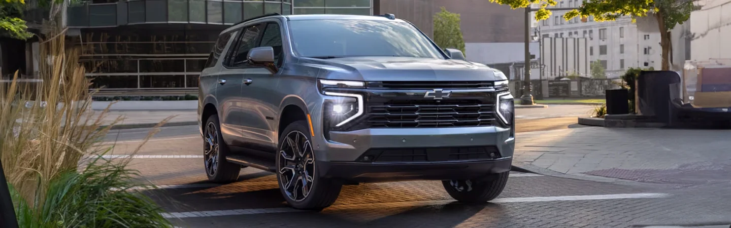 2025 Chevrolet Suburban Specs grey color and front view