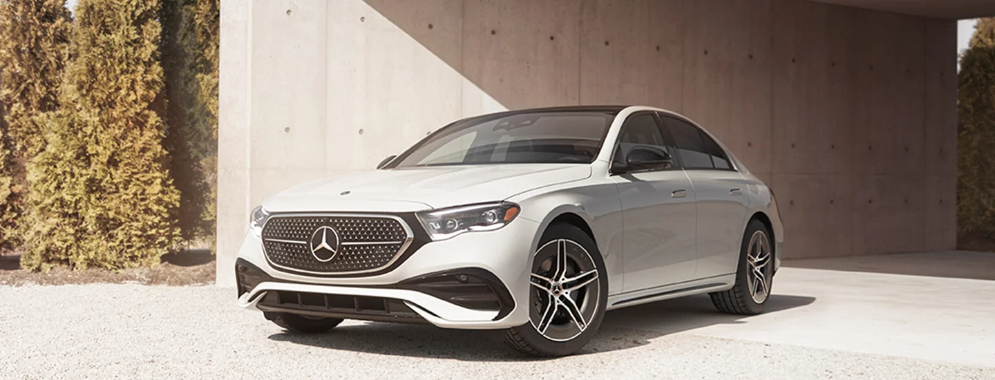 2025 Mercedes-Benz E-Class parked in front of a building