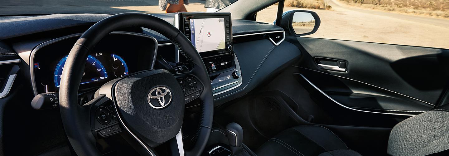 Interior view of the front seat of a 2021 Nissan Rogue