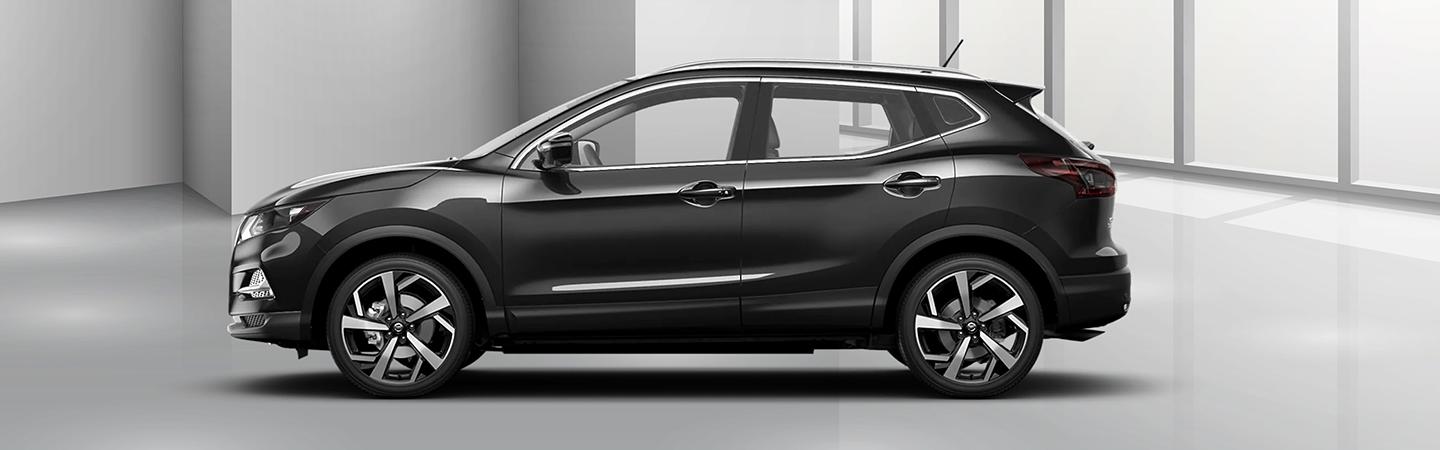 Side view of a gray 2021 Nissan Rogue