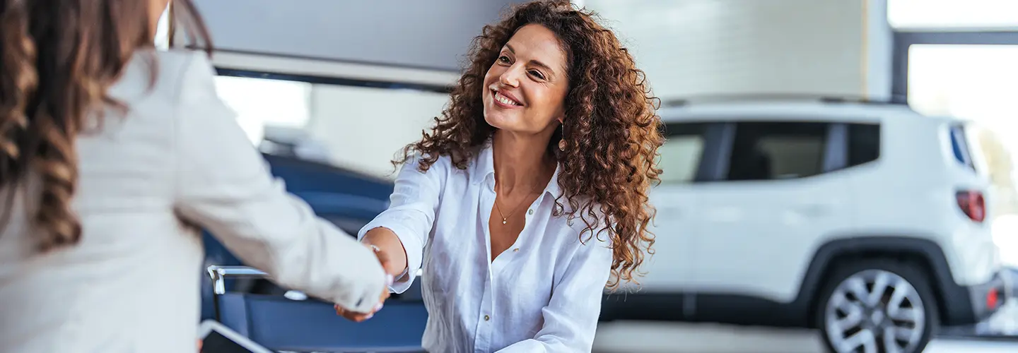 greeting customers at our dealership showroom