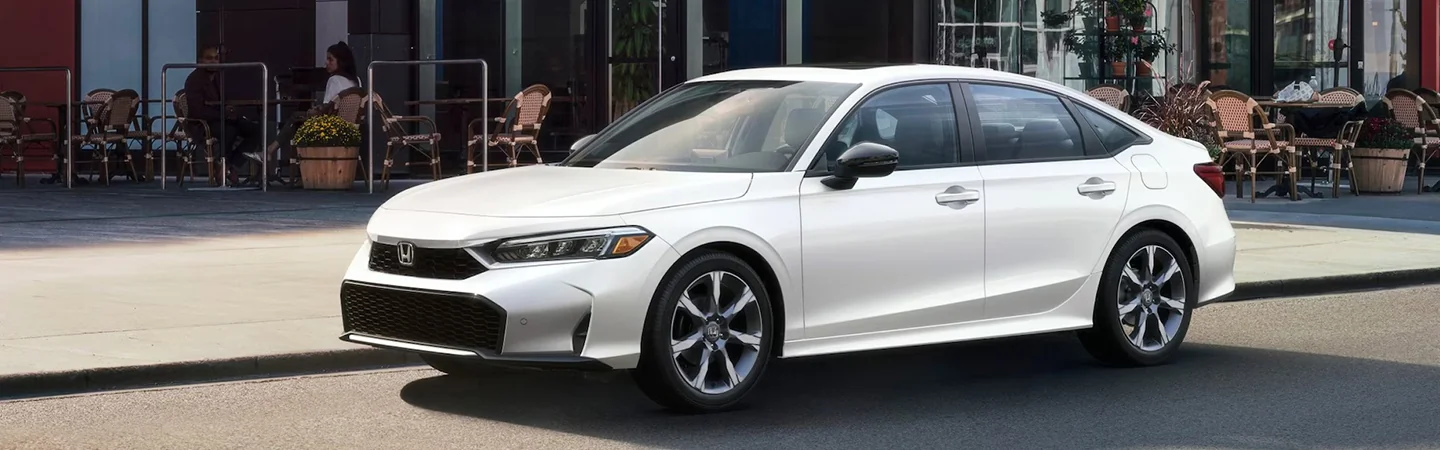 2025 Honda Civic Sedan Hybrid Specifications front side in silver 