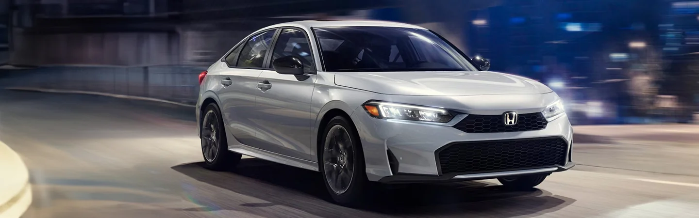 2025 Honda Civic Sedan Hybrid Specifications front side in silver 