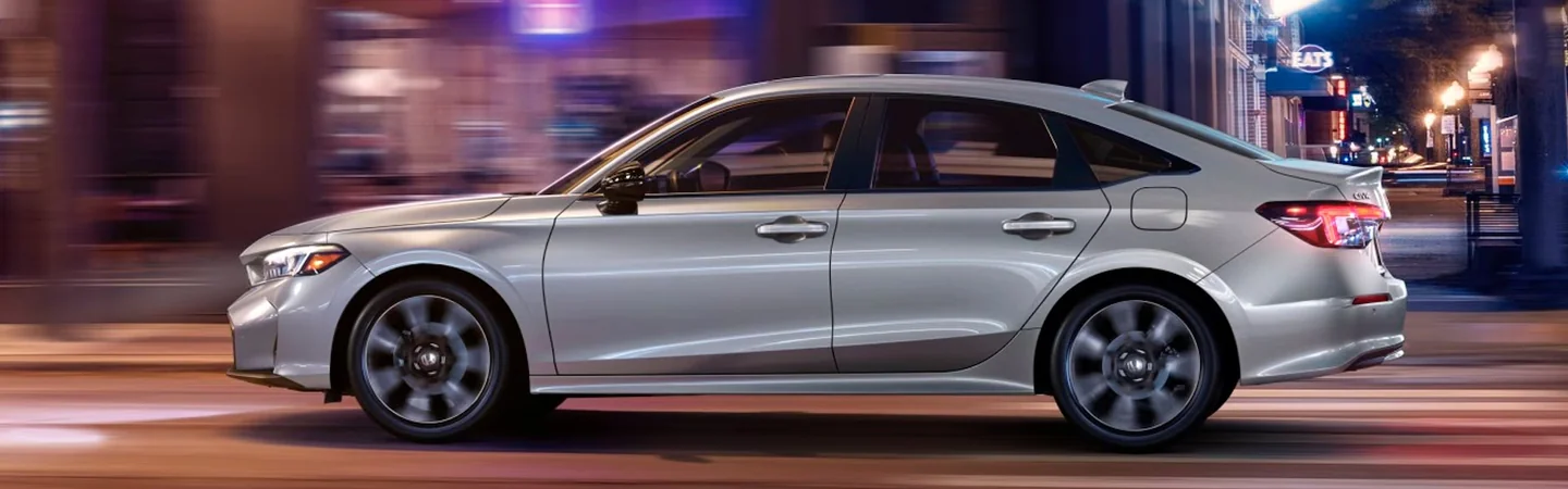 2025 Honda Civic Sedan Hybrid Specifications side front in silver 