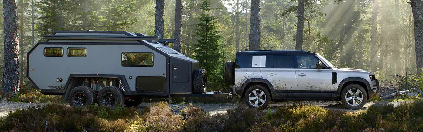 2024 Land Rover Defender side front in silver colour 