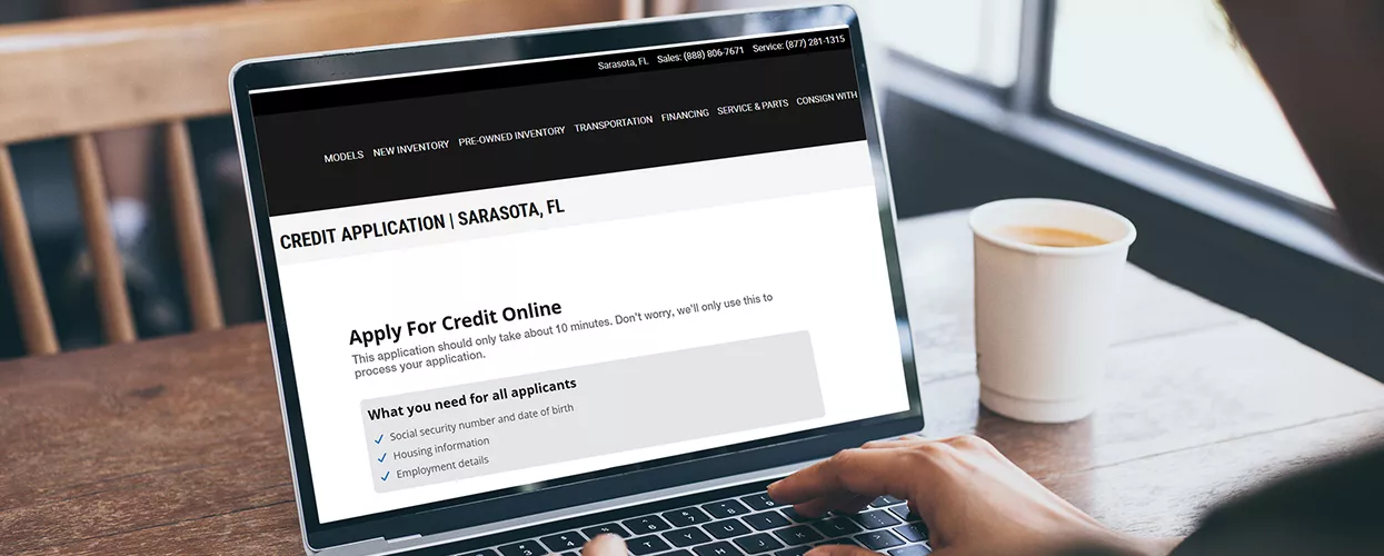 Someone looking up information about credit app online