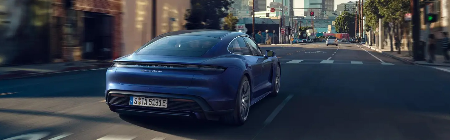 Porsche Taycan blue rearview