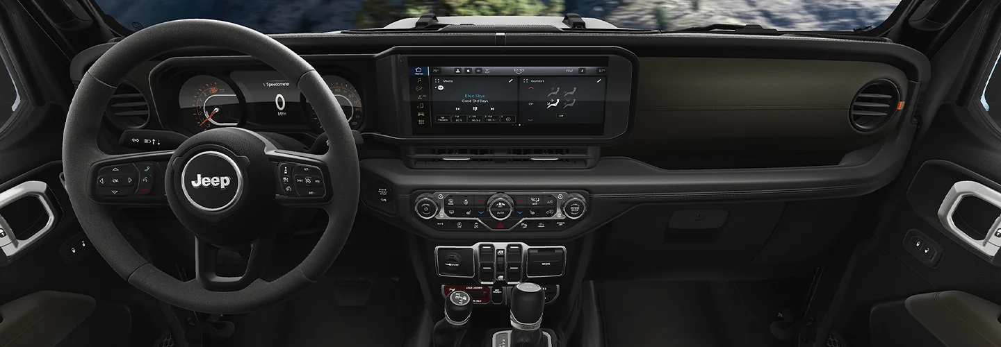 Interior view of the dashboard and tech of a 2025 Jeep Gladiator