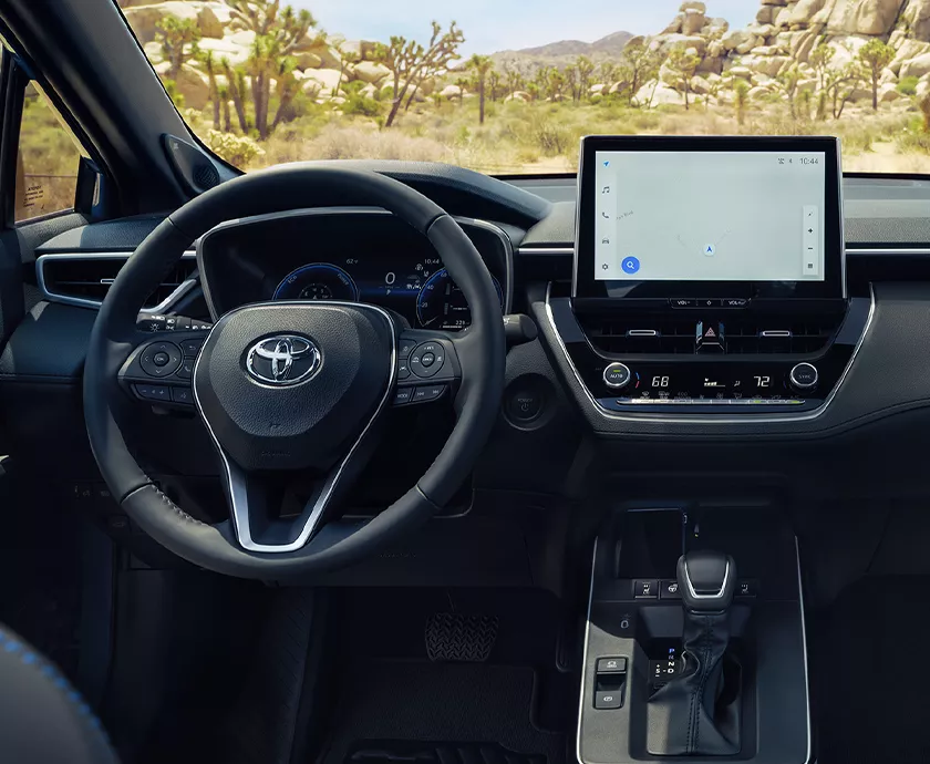 Interior view of the dashboard and tech of a 2026 Toyota Corolla Cross in Viera, FL