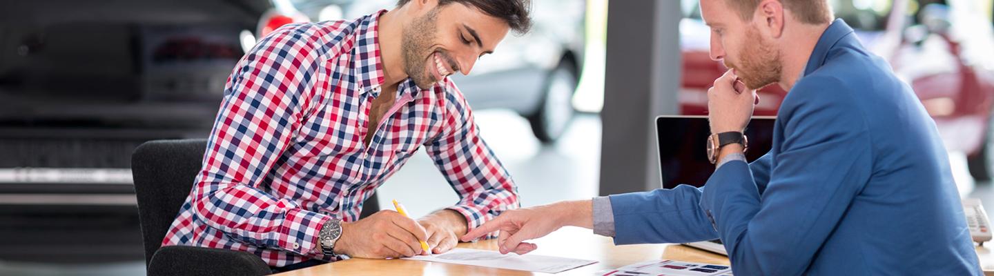 Customer signing finance papers