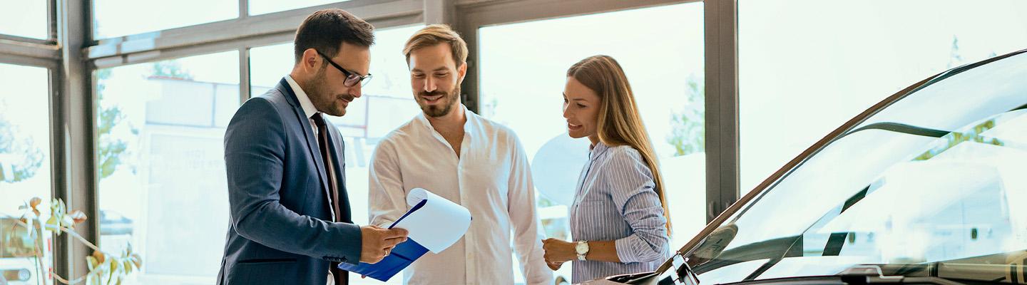 Sales person helping customers