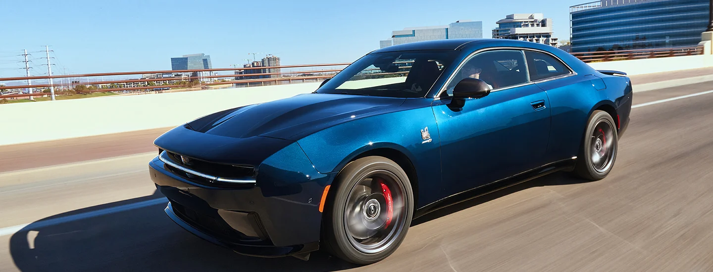 2025 Dodge Charger driving in a city