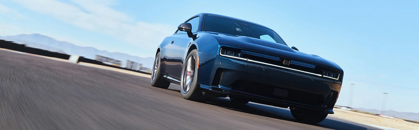 Alternate front view of the 2025 Dodge Charger driving