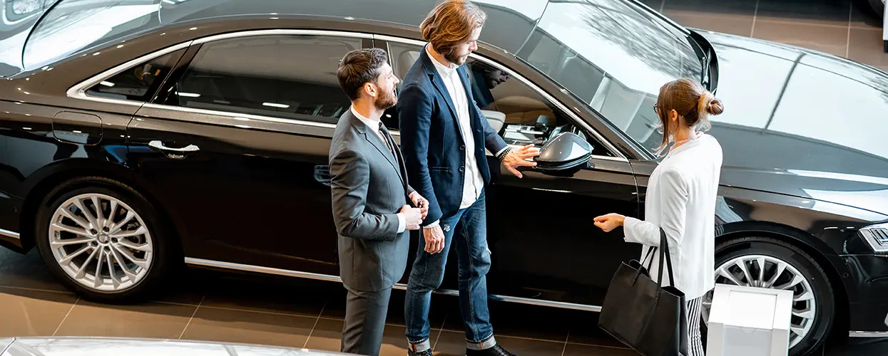 people car shopping in showroom
