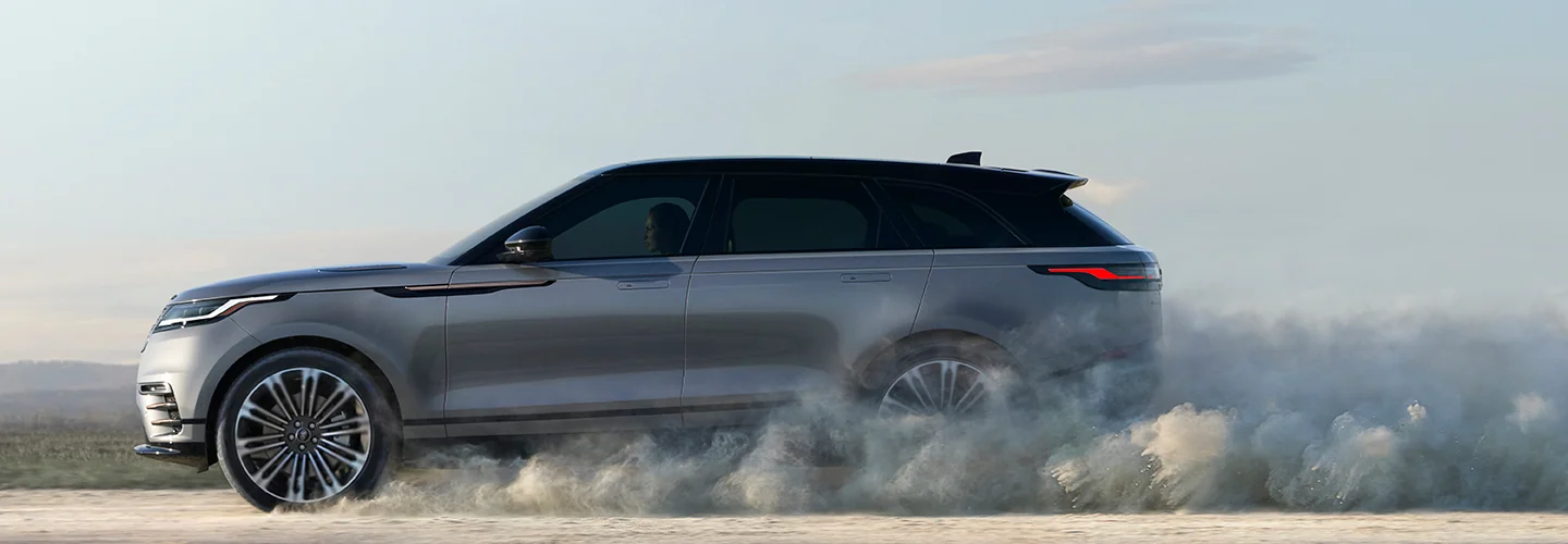2026 Velar SUV offroad kicking up some sand