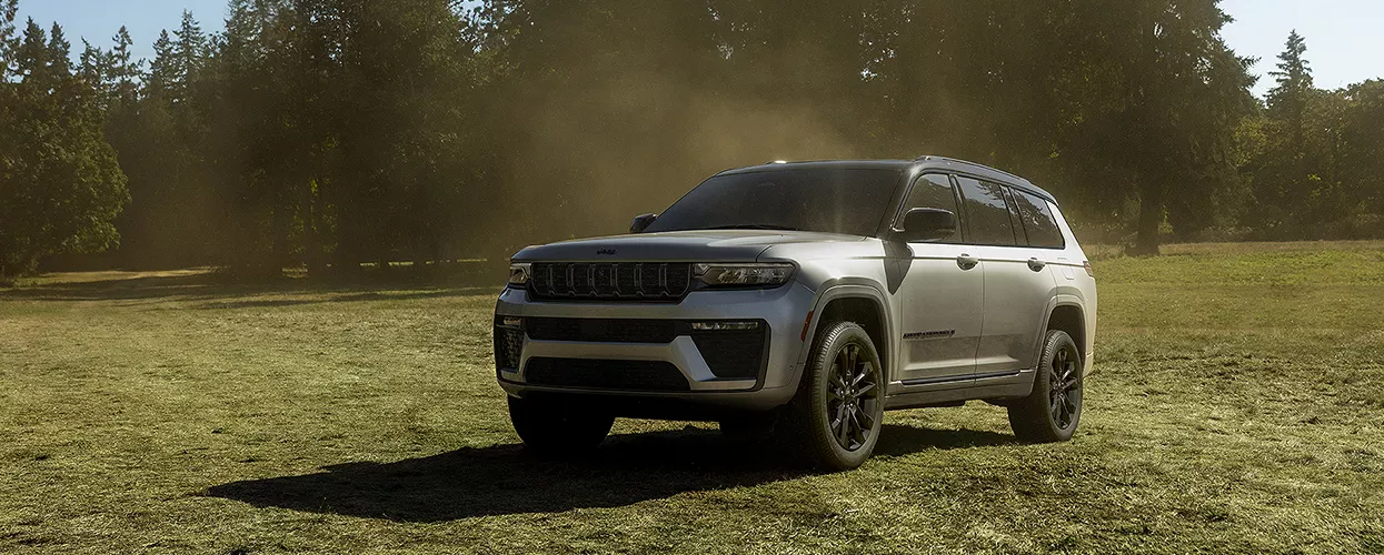 a silver Jeep Grand Cherokee in Lithia Springs, GA