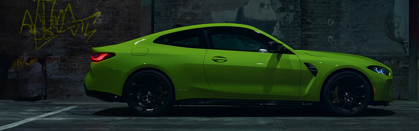 2024 BMW 4 Series Coupe green sideview