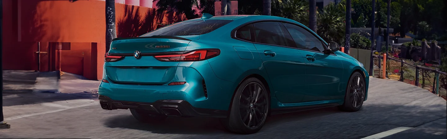 2024 BMW 2 Series side back in blue 