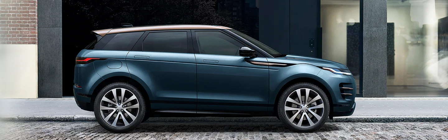 2026 Range Rover Evoque parked in front of a city building