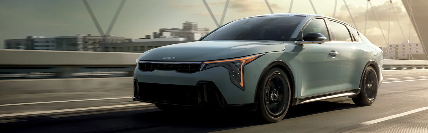 2025 Kia K4 on road driving