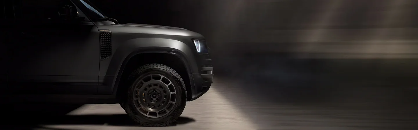 2025 Defender 110 OCTA Dimensions front tire viewn in black