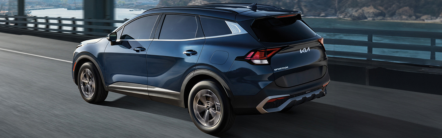 2025 Kia Sportage Hybrid on a bridge