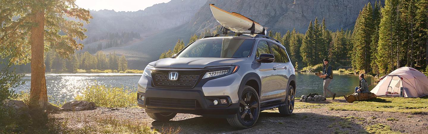 2021 Honda Ridgeline parked at camsite by lake