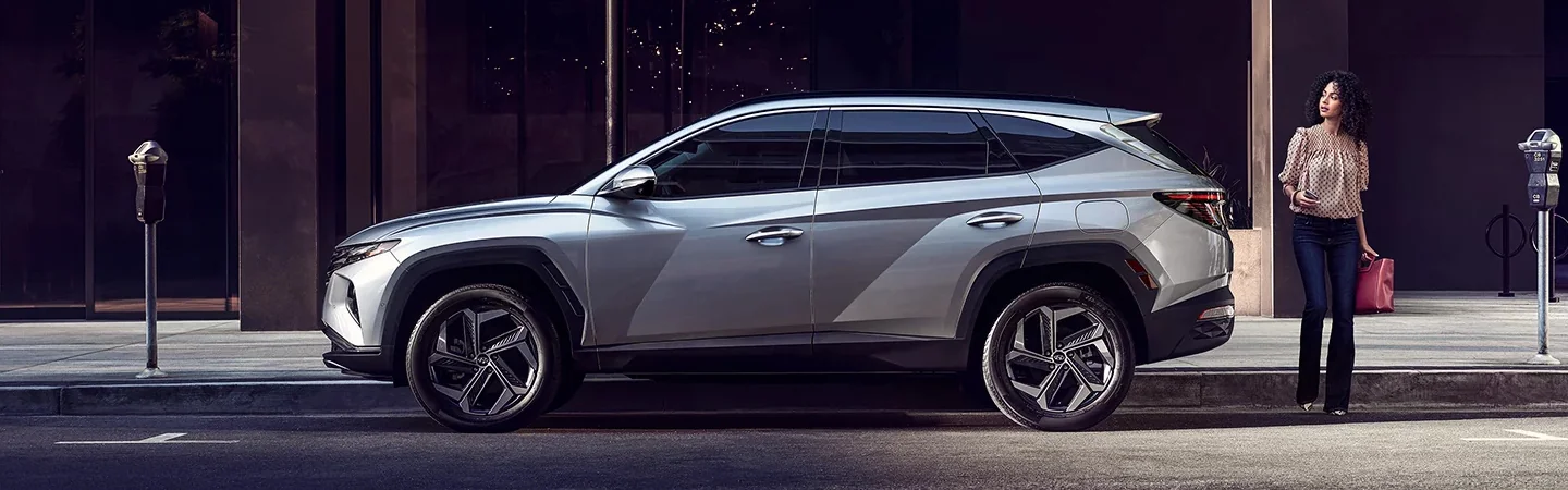 2024 Hyundai Tucson vs Palisade white color side view