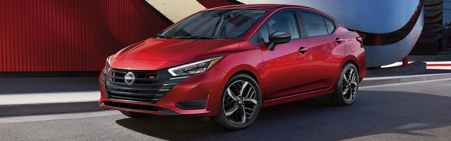 2024 Nissan Versa Specs frint sude in red 