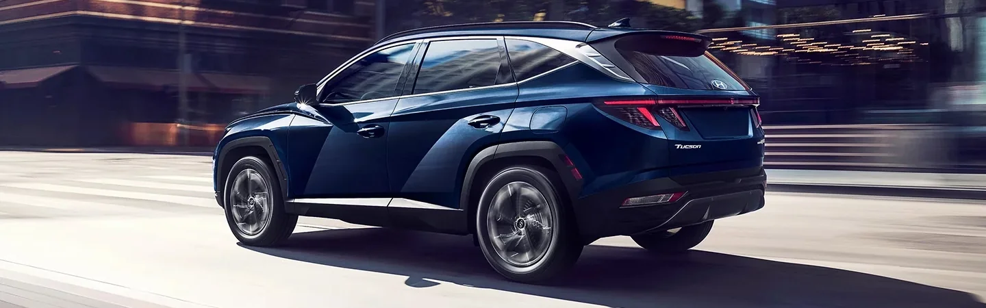 2024 Hyundai Tucson Specs side back in blue