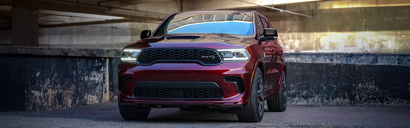 Front view of a 2025 Dodge Durango parked in an industrial area