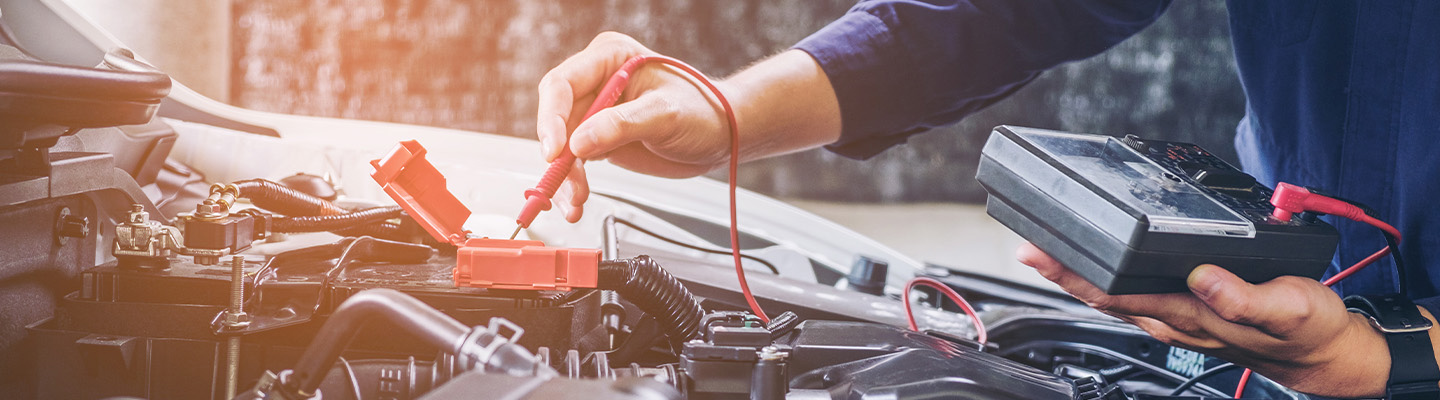 tech working on battery