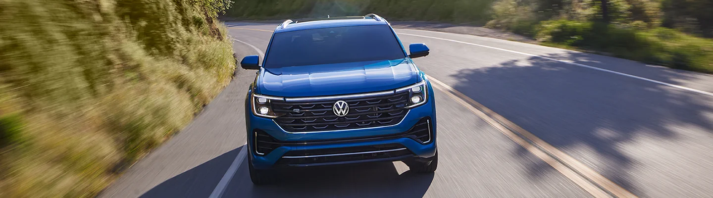 front view of a Volkswagen Atlas Cross Sport in motion