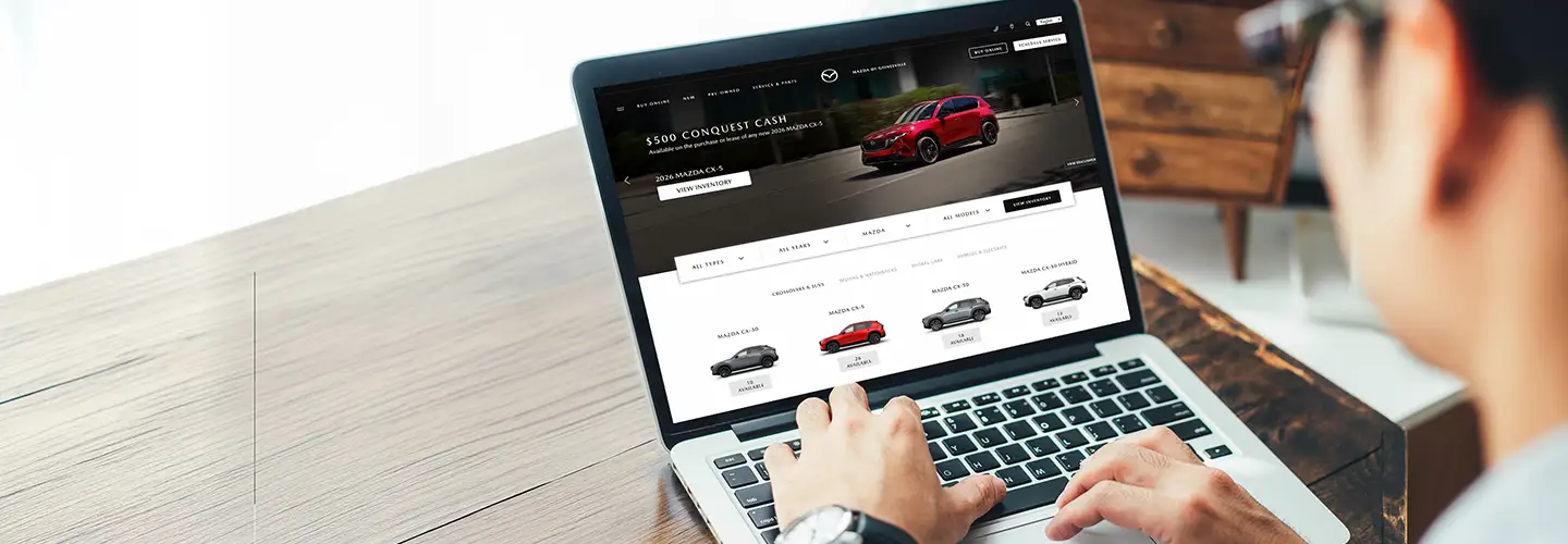 shopping for a new car at our dealership showroom