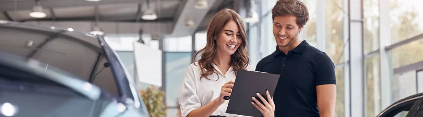 woman and man looking at tablet