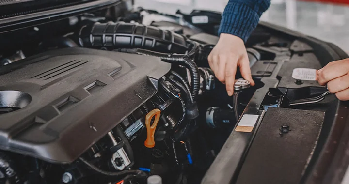 Mechanic checking engine