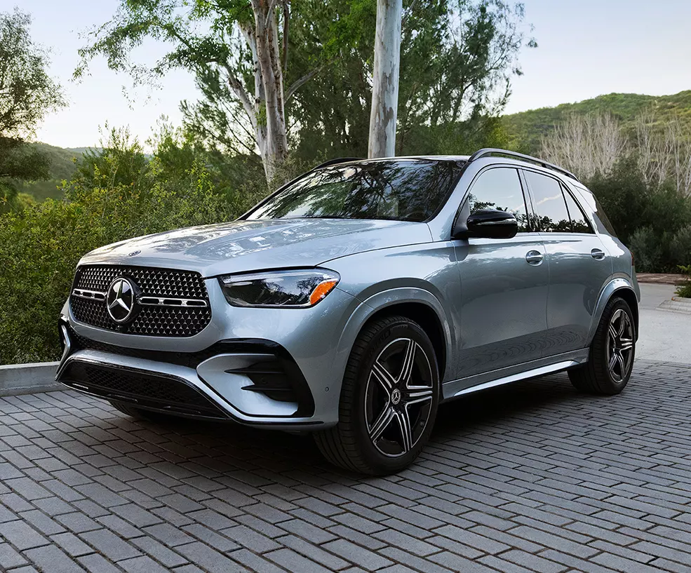 Front view of a parked gray 2027 Mercedes-Benz GLE in a driveway