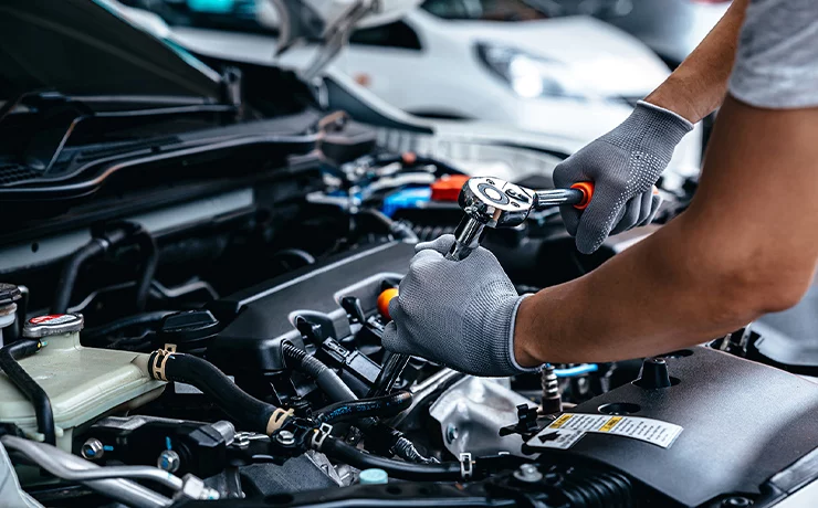 tech working on engine
