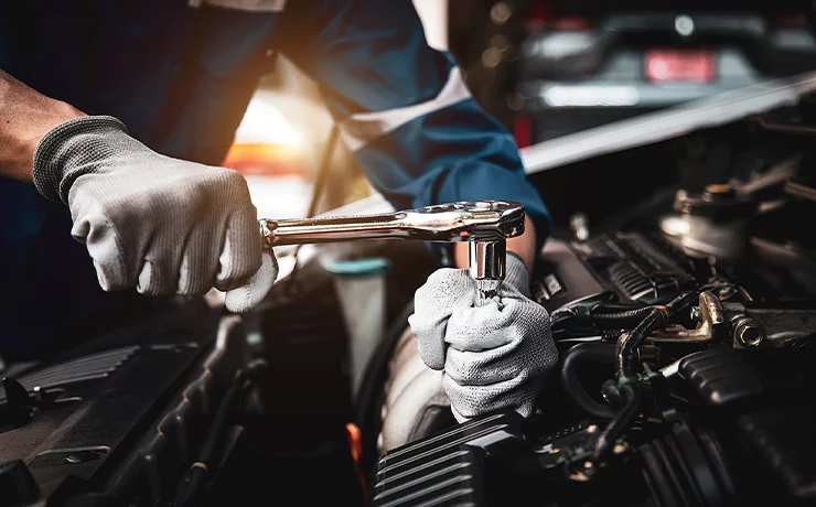 tech working under car