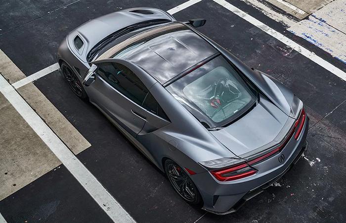 Overhead view of a parked silver Acura NSX