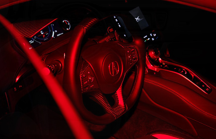 Close up view of an Acura NSX’s steering wheel