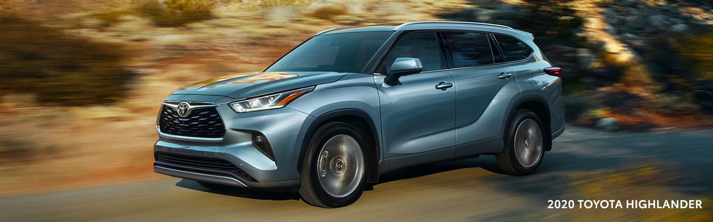 Blue 2020 Toyota Highlander in motion