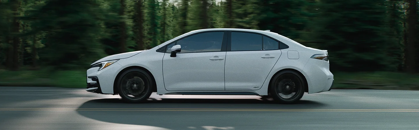 white Toyota Corolla parked