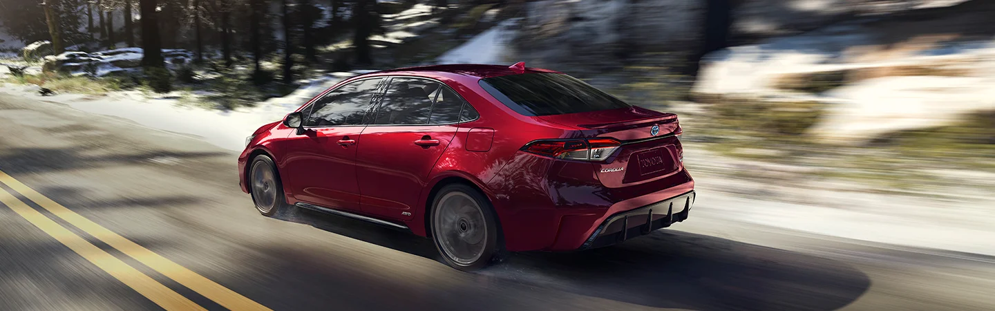 red Toyota Corolla parked