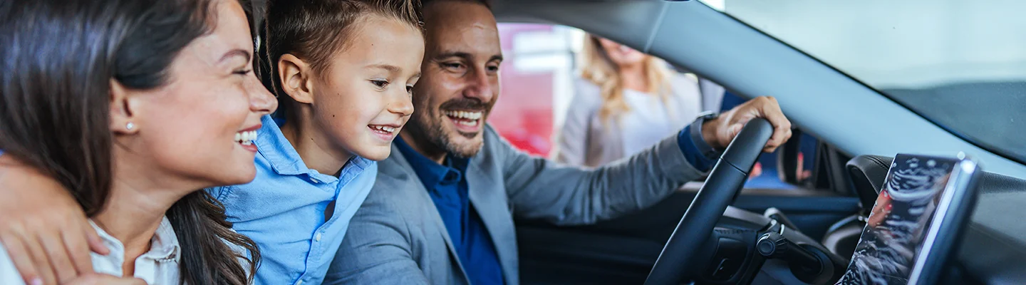 Happy Family checking out there new car