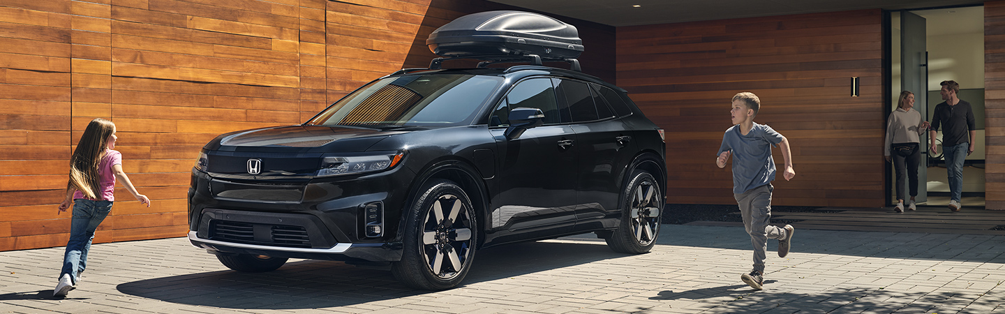 2024 Honda Prologue vs Toyota RAV4  back side in white colour 