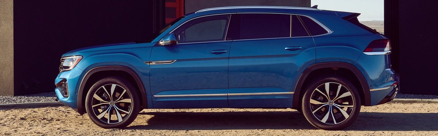 2024 Volkswagen Atlas Cross Sport side front in blue colour