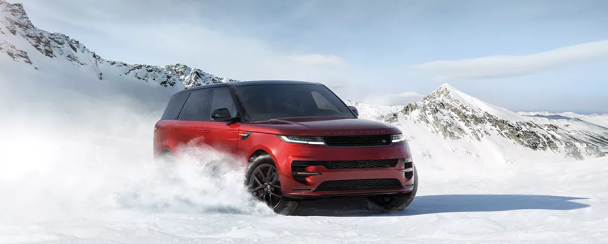 Land Rover Range Rover driving in the snow